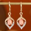 Aretes Ojo de Ángel Ojo de Gato para Mujer Estilo Francés Lujo Ligero Creativo Diamante Gota Aretes Estilo Europeo y Americano Diamante Oreja Trendy