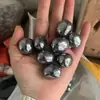 Venta al por mayor de fábrica Piedra Rodante de Terahertz Natural Red de Fósil Hueso Ornamentos de Partículas Grandes Piedra Decorativa para Acuario Grava de Cristal