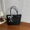 Bolso tote vintage de gran capacidad 2026 nuevo de moda color sólido bolso de hombro casual elegante para el trabajo y el día a día