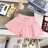 Shorts Casuales de Encaje de Color Sólido para Niñas Primavera y Verano 2026 Dulces Lindos Finamente Ribeteados Sueltos Frescos Pantalones Modernos
