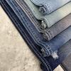 En stock 10 10*10 Algodón OE hilado Siro Tela para pantalones falda de hombre y mujer proceso de agujeros desgastados con agua de lavado