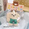 Pequeños regalos de fiesta empaquetados individualmente, lindos colgantes de peluche, muñecos de dibujos animados, muñecos para lanzar en bodas, recuerdos de fiesta y decoraciones colgantes