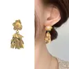 Pendientes de borlas con forma de hoja de perla y aguja de plata, diseño de personalidad de viento frío, pendientes de temperamento de Joker de nicho, venta al por mayor