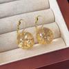 Pendientes de resina con diseño retro de bola grande transparente con lámina de oro ámbar y hebilla para oreja. Pendientes pequeños con diseño de cara suave otoñal.