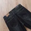 Estación europea verano fino negro azul súper suave antiarrugas cintura media-alta elástico para hombre casual de negocios jeans rectos