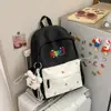 Nova Mochila Lisa Estilo Coreano, Mochila Escolar Casual e Leve para Alunos do Ensino Fundamental, Letras Bordadas de Alto Valor, Mochila para Alunos do Ensino Médio