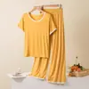 2026 Nuevo Modelo 8 Colores Color Sólido con Copas Acolchadas Dulce Casual Manga Corta Shorts Conjunto de Pijama de Verano para Mujer Ropa de Casa