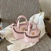Bolso de mano para mujer estilo coreano transfronterizo 2026 principios de otoño nuevo popular versátil bandolera cruzada bolso cubo