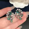 ¡Colores ricos y vibrantes! Pendientes de flor de circonita cúbica de colores, pendientes de estilo corte vintage, pendientes de alta gama transfronterizos europeos y americanos para mujer