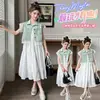 Vestido de niña para verano 2026, nueva ropa infantil elegante, vestido de tirantes estilo coreano, vestido tipo chaleco largo para niños mayores, moderno