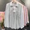 Camisa de protección solar para mujer, chaqueta fina, nuevo top de manga larga estilo francés, diseño de alta gama, camisa de tendencia nicho