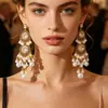 Brincos estilo étnico boêmio brincos longos com franja esculpida retro incrustados com diamantes gota leve luxo brincos de alta qualidade