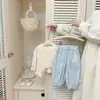 Camisola Bonita para Niñas de Primavera y Verano 2026 Nuevo Estilo Ropa de Bebé Diseño Coreano Elegante Top con Parches de Encaje