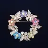 Moda súper ventas de alta gama broche de anillo de mariposa coreano con incrustaciones de diamantes pasador de joyería para ropa boda corsage colorido venta al por mayor