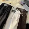 Pantalones Casuales Gruesos Forrados de Polar Estilo Americano Lana de Cordero Otoño Invierno Pantalones de Chándal Sueltos Cálidos Pierna Recta Pantalones de Pana Tendencia
