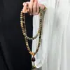 Explosões ao vivo molho de ameixa preta raiz de bodhi rosa 108 lótus esculpidos amantes masculinos e femininos pulseira de mão texto brincadeira