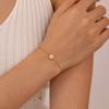 Pulsera de temperamento francés estilo commuter para mujer diseño de moda nicho acero inoxidable flor de cinco hojas incrustada circón joyería al por mayor