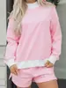 Traje casual holgado de tendencia de moda europea y americana para mujer, nuevo conjunto de dos piezas a rayas de manga larga para invierno 2025 para mujer