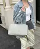Bolso de mano de nube de fila transfronterizo para mujer, bolso tote de cuero genuino de gran capacidad, bolso cruzado simple para el día a día, venta al por mayor de fábrica