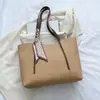 Bolso tote de gran capacidad para mujer para exportación, nuevo bolso de hombro casual primavera/verano 2026, bolso tote retro europeo y americano para el día a día