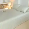 Un tipo de sábana de cama de tela gruesa de algodón puro, vieja y áspera, pieza individual, edredón individual de verano de algodón puro, funda de almohada, juego de tres piezas, tapete de algodón y lino