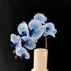 Sensación de primavera transfronteriza 7 cabezas Phalaenopsis rama única flor de simulación flor artificial hotel fondo de boda flor flor decorativa para sala de estar