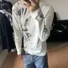 Colección de otoño transfronteriza nueva: Camiseta de manga larga con estampado moteado estilo americano para calle, unisex, moderna, top casual holgado