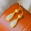 Pendientes Palacio Estilo Geométrico Chapados en Oro Incrustados Hotan, Pendientes Personalizados de Moda Estilo Antiguo Hotan para Mujer