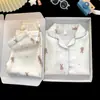Pijama infantil de algodón nube para primavera y otoño transfronterizo, conjunto de manga larga con cuello camisero fino para niños, ropa de casa para niños mayores, comercio exterior