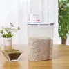 Cubo de arroz portátil con taza medidora, tarro de almacenamiento multi-grano para cocina, tarro de plástico sellado a prueba de humedad, tarro de almacenamiento de alimentos de 2 kg, venta directa