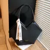 Bolsa Feminina Transfronteiriça Estilo Coreano Nicho Simples Cor Contrastante Bolsa de Ombro 2026 Nova Grande Capacidade Bolsa Tote para o Dia a Dia Bolsa de Mão