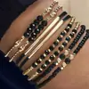 Pulsera de Moda para Mujer Tejida a Mano con Cuentas de Cristal Negro Curvadas y Cuentas de Arroz, Nuevo Set de Múltiples Piezas, Transfronterizo Europeo y Americano