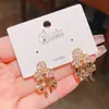 2025 Nuevos Pendientes Exquisitos de Flor con Lazo y Circonita Estilo Coreano Elegantes Versátiles de Moda Pendientes con Estilo