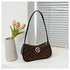 Bolsos estampados populares transfronterizos para mujer 2026 nuevo estilo coreano con textura, bolso de hombro moderno y versátil, bolso de axila elegante