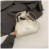 Bolso de mano de nicho de moda coreana muy elegante, bolso tipo bowling, nuevo de verano 2026, bolso de hombro cruzado casual retro