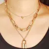 Collar con colgante de corazón de melocotón, cadena multicapa retro, joyería transfronteriza europea y americana, collar con colgante de candado geométrico de moda creativa para mujer