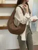 Bolsa feminina 2026 novo modelo, bolsa tote nicho casual simples leve de grande capacidade, versátil para uso diário e deslocamento, bolsa em formato de crescente