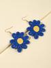 Pendientes bohemios de verano con flores de rafia tejidas a mano para vacaciones en la playa