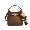 Lujo Ligero Piel de Vaca Estilo Nuevo Patrón Lichi Conveniente Bolso Kelly Gran Capacidad Nicho Bolso de Mano para Viaje de Negocios y Compras Bolso Cruzado para Mujer