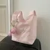 Bolso de mano rosa estilo Ins con bordado de lazo, ligero y portátil, con un diseño único, exquisito bolso pequeño de tela para mujer