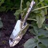 Venta al por mayor del fabricante Herramientas de jardín Pala pequeña de acero inoxidable Pala para flores Pala pequeña de hierro para cavar lombrices de tierra y verduras silvestres