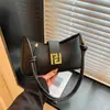 Moda Primavera 2025 Bolso Baguette Moderno y Personalizado Tendencia de Moda Diseño de Nicho Bolso de Hombro Cruzado con Textura para Mujer