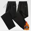 Pantalones casuales gruesos con forro polar para hombre, pantalones deportivos de otoño e invierno, corte holgado, versátiles, pantalones rectos con puño, pantalones largos para hombre