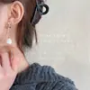 Pendientes de Clip de Moda Populares Transfronterizos con Borlas, Flor de Cuatro Hojas Elegantes, Pendientes de Clip Clásicos, Personalidad Exquisita, Pendientes Frescos de Nicho