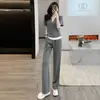 Traje deportivo casual de estilo europeo para mujer, conjunto de dos piezas ligero de verano a la moda, top ajustado de imitación de dos piezas con pantalones largos de pierna ancha