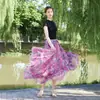 26 Nova Saia Estampada Estilo Boho Resort Europeu e Americano Primavera/Verão com Barra Larga para Mulheres