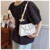 Bolsa Feminina Casual Estilo Western Retrô de Um Ombro Sob o Braço Moda Feminina 2025 Verão Nova Tendência Bolsa de Moda Feminina
