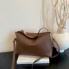 Bolso de hombro, bandolera y bolso de mano de alta calidad, con estampado de lichi, gran capacidad, nuevo en la moda de otoño 2026, simple, elegante y versátil