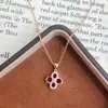 Collar Colgante de Trébol de Cuatro Hojas Rojo Estilo Nacional para Mujer, Lujo Ligero, Gama Alta, Elegante, Estilo Ins, Corindón Rojo al por Mayor
