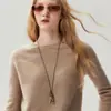 Bai Cai Rong 100% caxemira outono e inverno 2026 nova malha de gola redonda com mangas raglan e bainha dobrada, malha justa, camiseta base